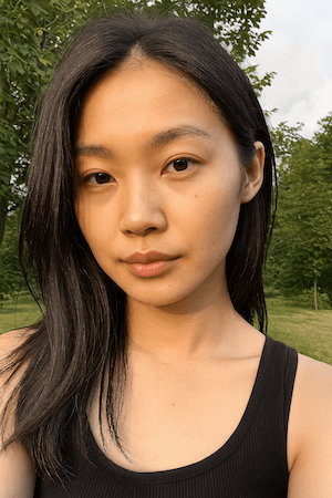 シックな黒コーデの女性が自信に満ちたポーズをとるスタジオ写真 - Stable Diffusion AI生成画像